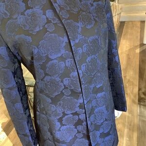Beautiful brocade jacket blue roses.  Black background